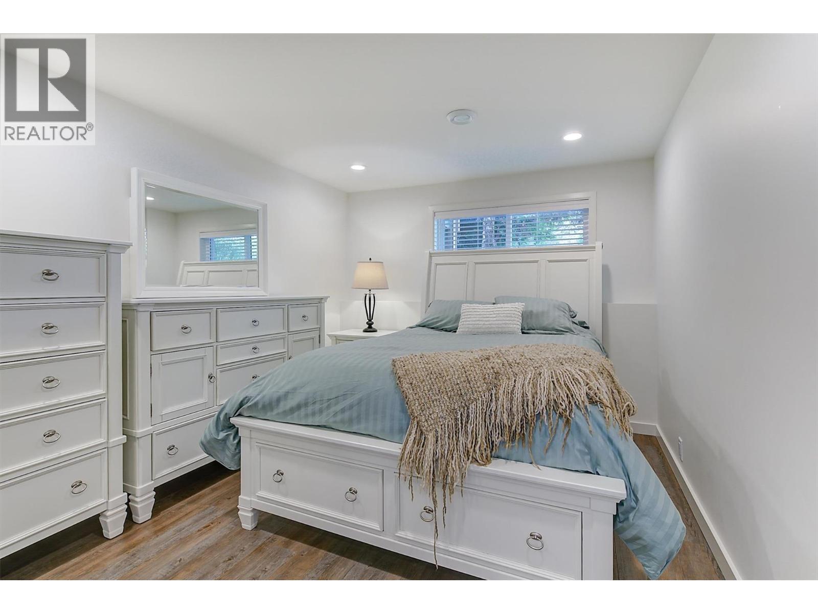 King Size bedroom - 5127 Luckett Court, Kelowna, BC - Indoor Photo Showing Bedroom