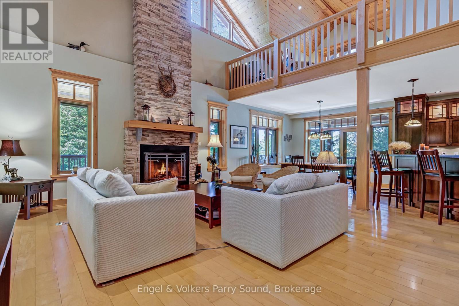 35 Shakell Road, Whitestone (Dunchurch), ON - Indoor Photo Showing Living Room With Fireplace