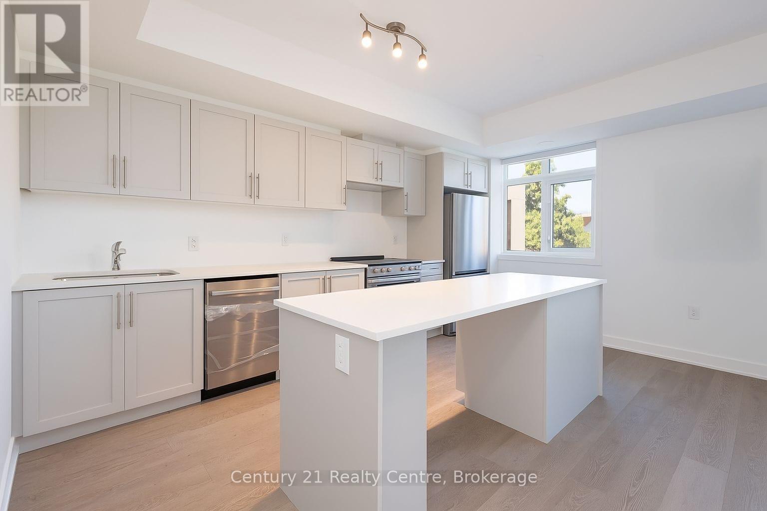 206 - 1115 Douglas Mccurdy Common E, Mississauga, ON - Indoor Photo Showing Kitchen