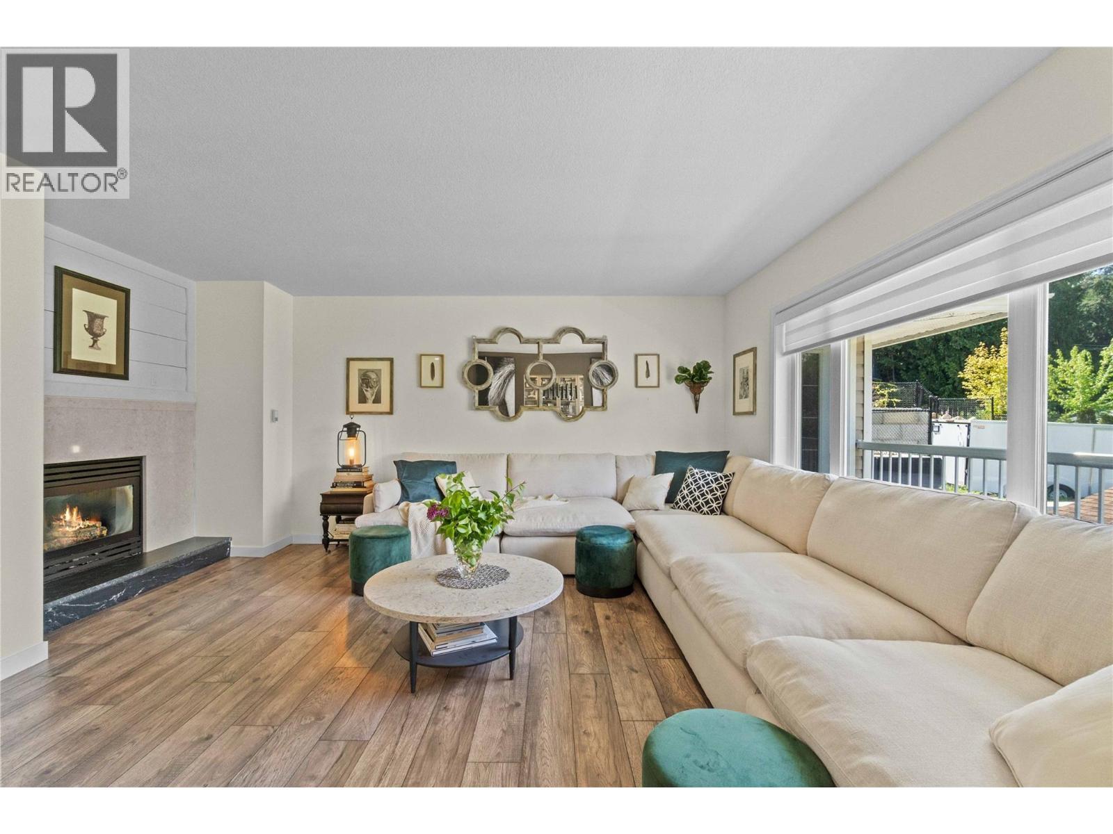 2449 Waverly Place, Blind Bay, BC - Indoor Photo Showing Living Room With Fireplace