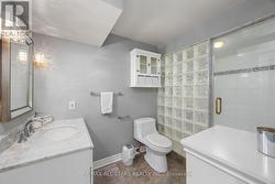 Basement bath with heated floors + steam showe -