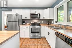 Kitchen featuring new stainless stell appliances -
