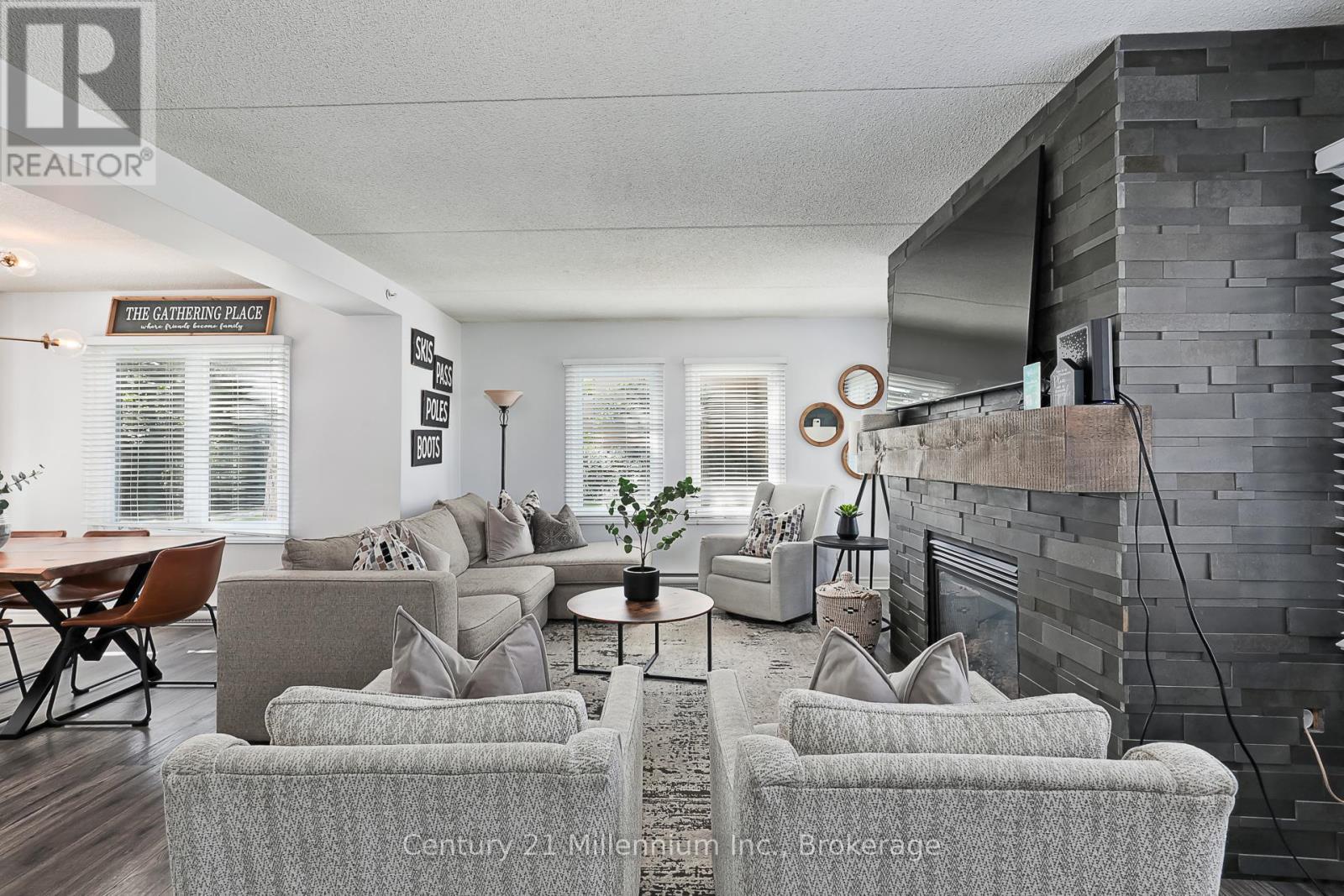 118 - 169 Jozo Weider Boulevard, Blue Mountains, ON - Indoor Photo Showing Living Room With Fireplace
