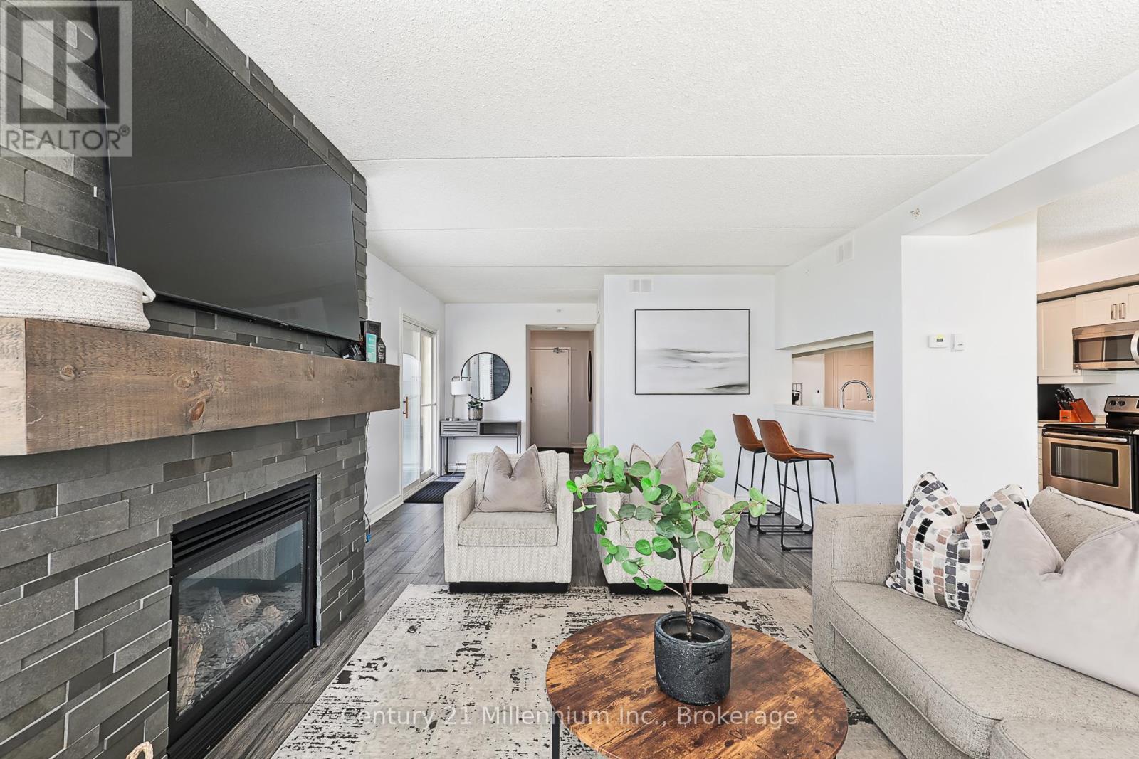 118 - 169 Jozo Weider Boulevard, Blue Mountains, ON - Indoor Photo Showing Living Room With Fireplace