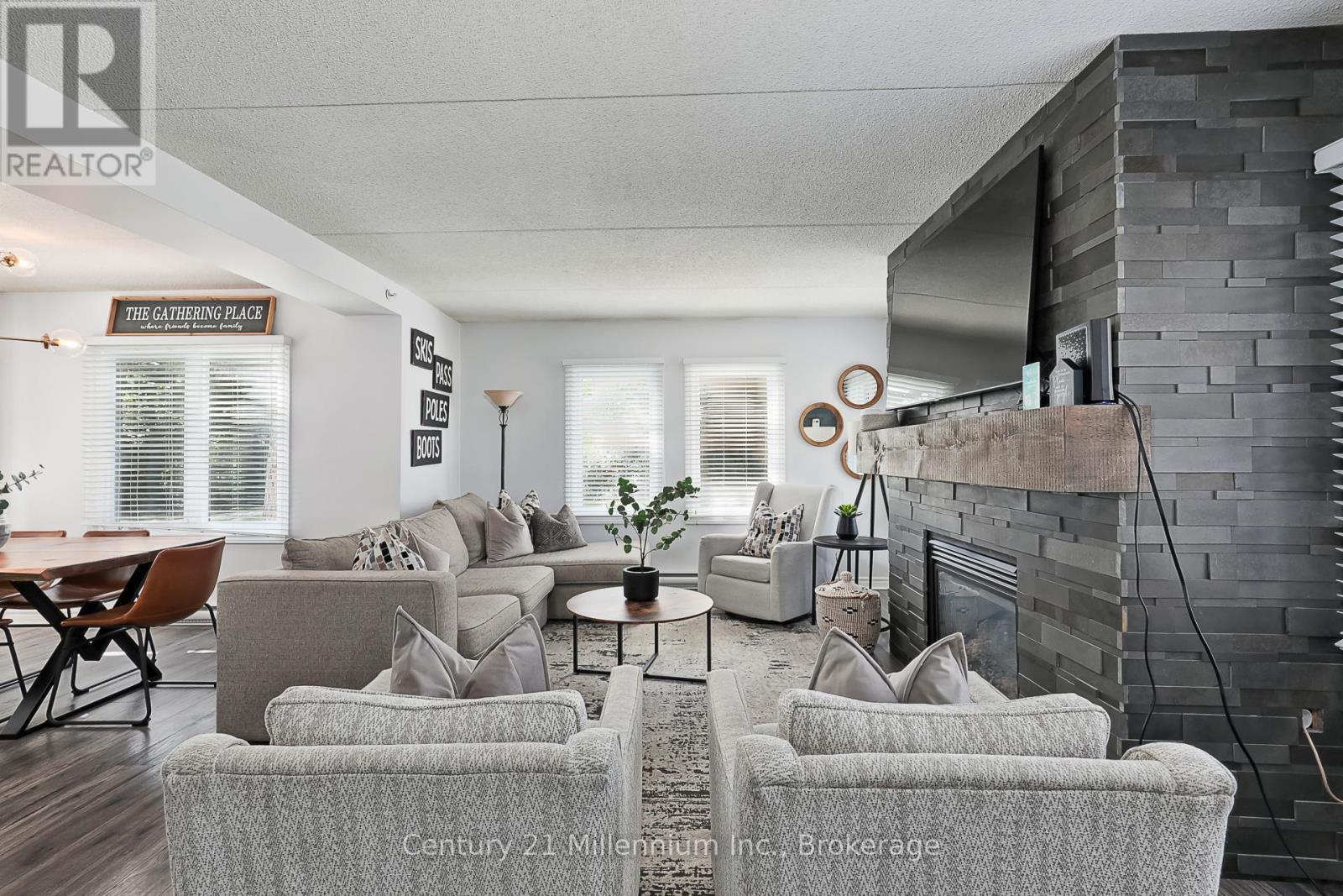 118 - 169 Jozo Weider Boulevard, Blue Mountains, ON - Indoor Photo Showing Living Room With Fireplace