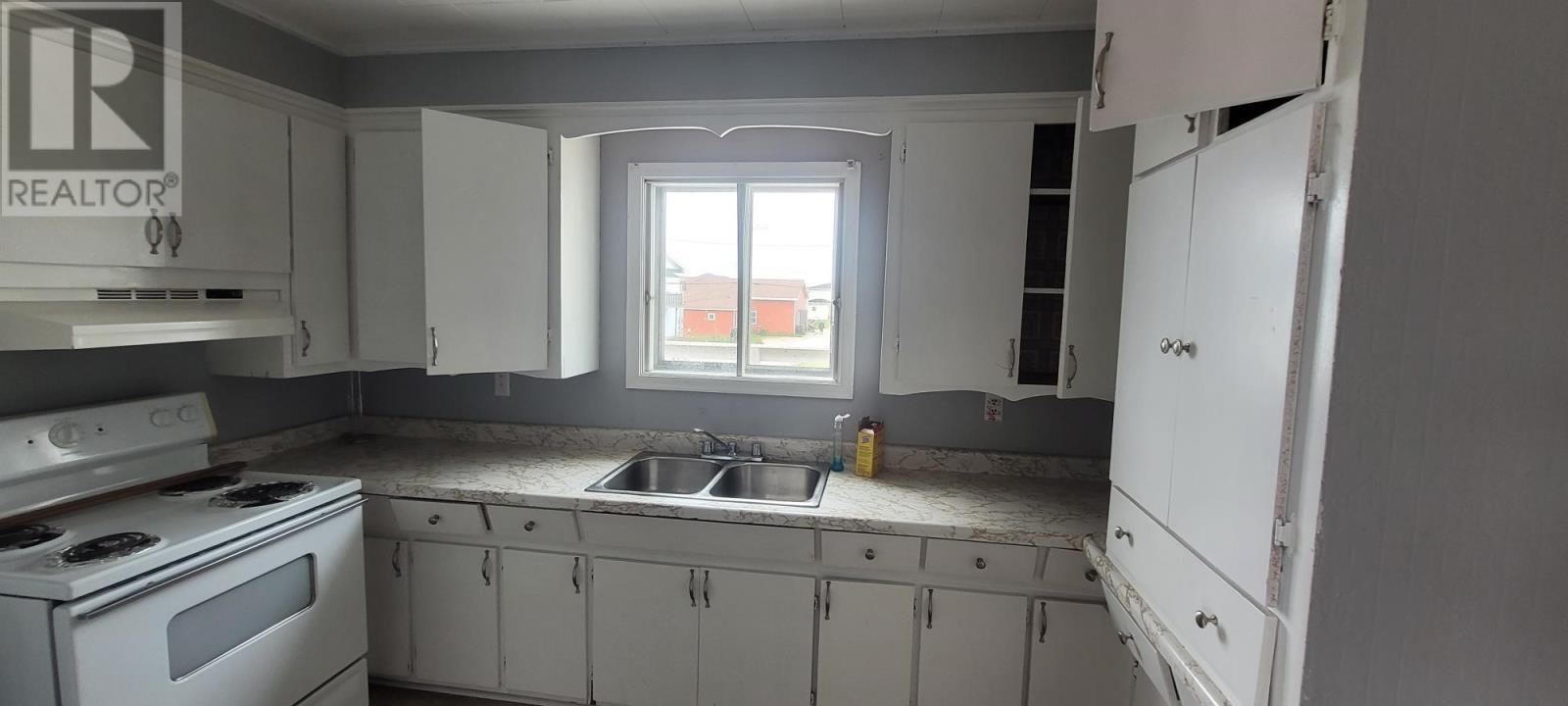 43 Legallais Street, Channel-Port Aux Basques, NL - Indoor Photo Showing Kitchen With Double Sink
