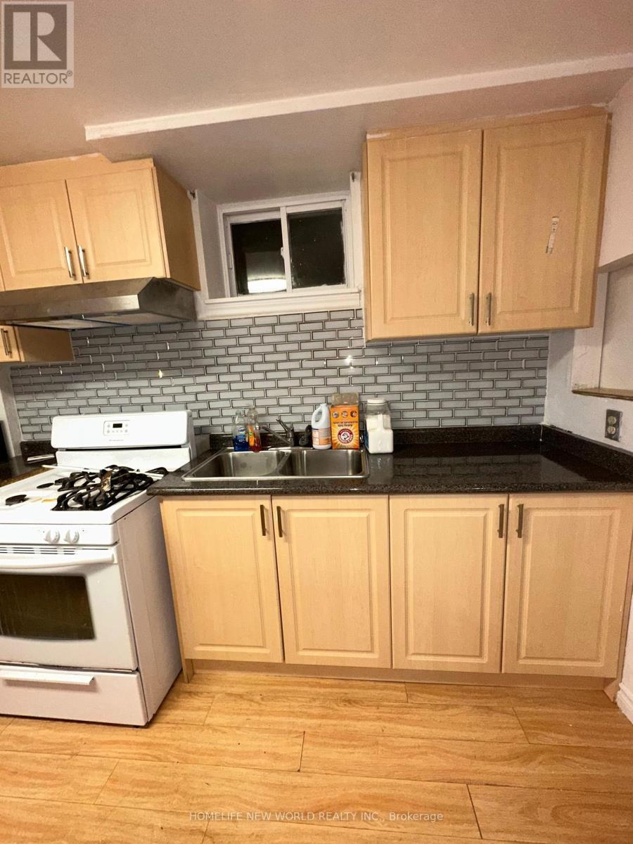 Bsm - 6 Stoneton Drive, Toronto, ON - Indoor Photo Showing Kitchen With Double Sink