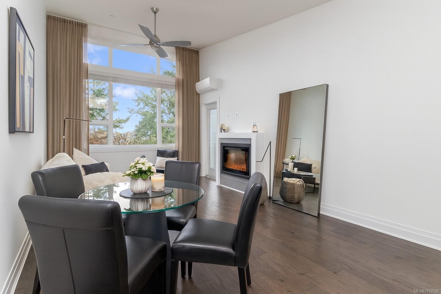 415-1145 Sikorsky Rd, Langford, BC - Indoor Photo Showing Dining Room With Fireplace
