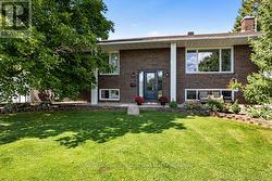 Welcoming all brick home, new windows & front door -