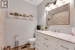 Main 4-pc bathroom with porcelain tile floor -