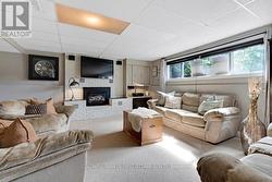 Family room has fireplace with gas insert -