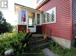 Entrance into front Sunroom -