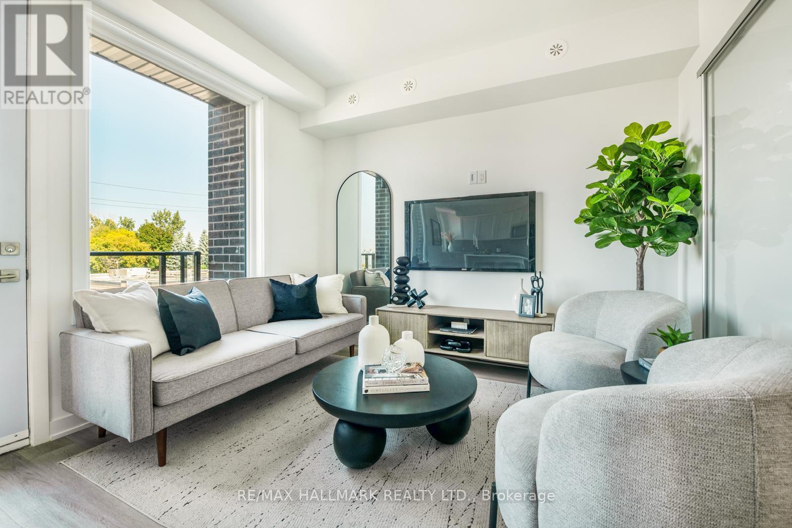 21 - 1455 O'Connor Drive, Toronto, ON - Indoor Photo Showing Living Room