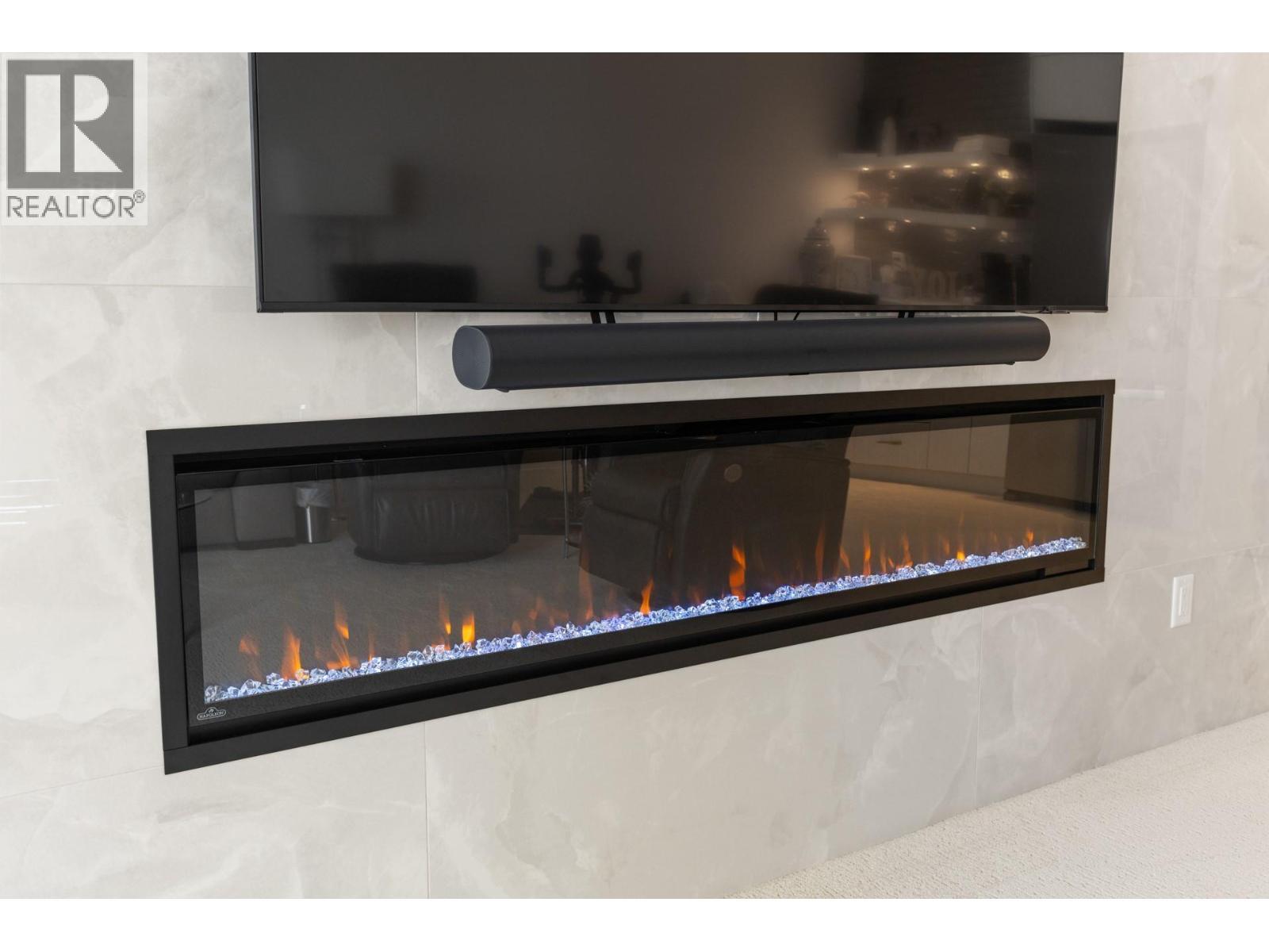 470 Hawk'S Perch Lane, Kelowna, BC - Indoor With Fireplace