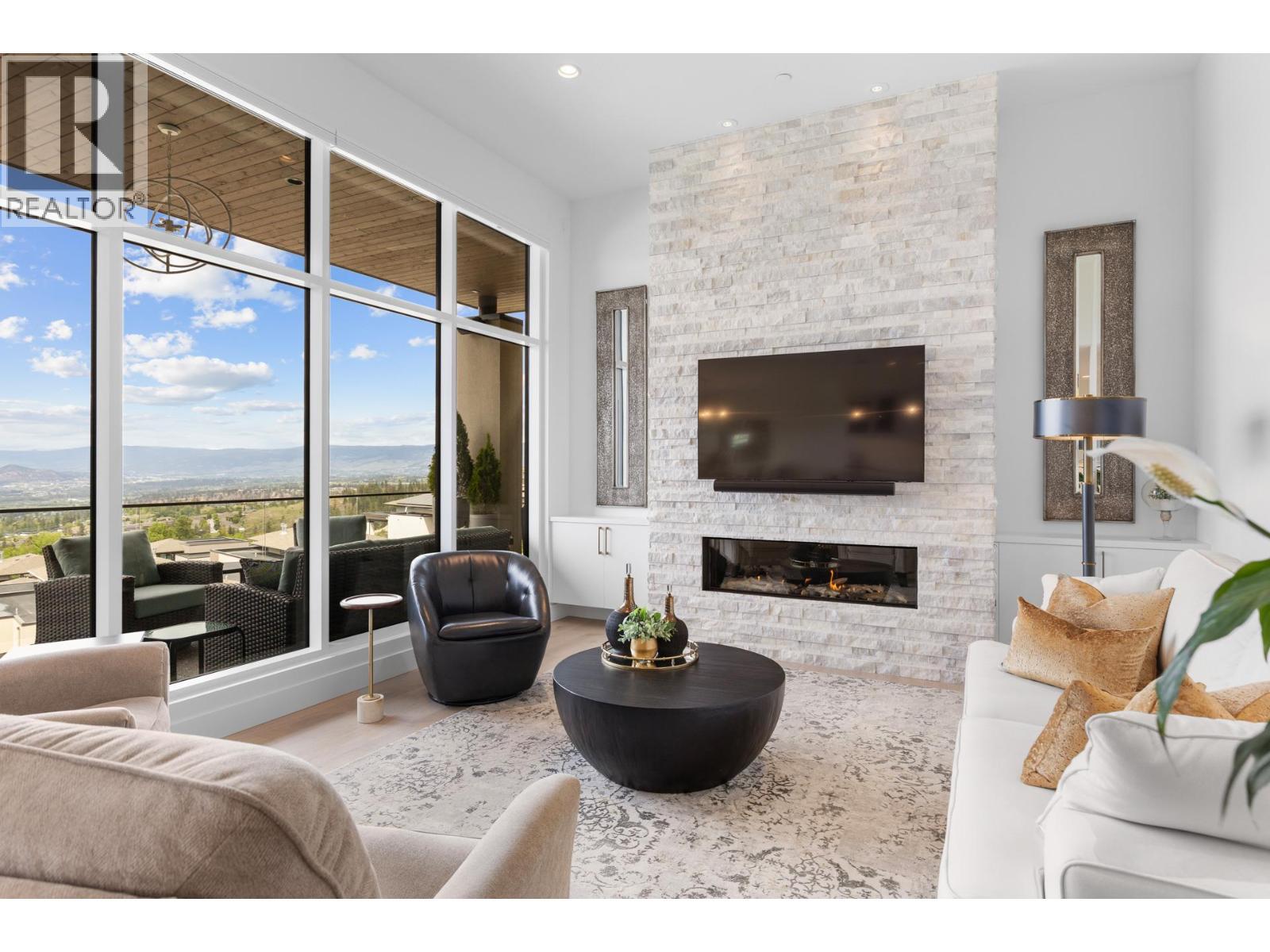 470 Hawk'S Perch Lane, Kelowna, BC - Indoor Photo Showing Living Room With Fireplace