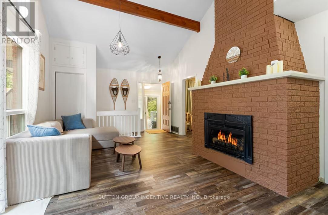 222 Wiles Lane, Grey Highlands, ON - Indoor Photo Showing Living Room With Fireplace