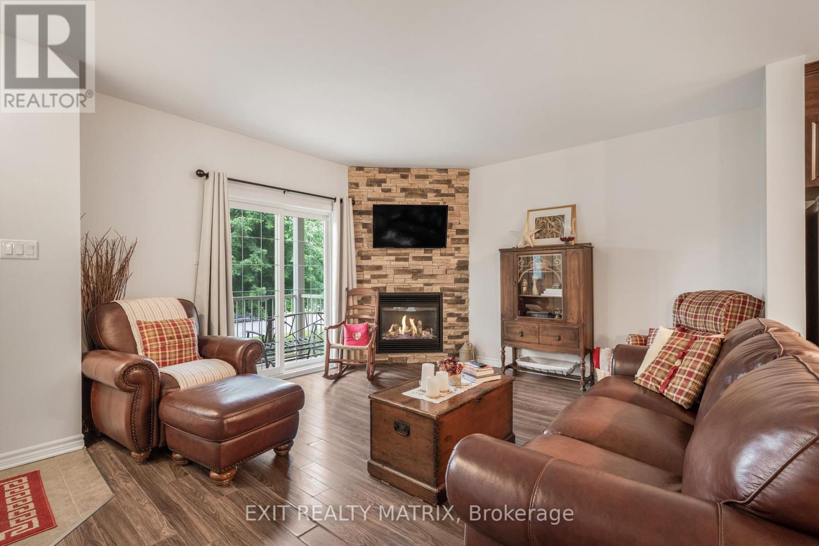 2 - 193 Bourdeau Boulevard, The Nation, ON - Indoor Photo Showing Living Room With Fireplace