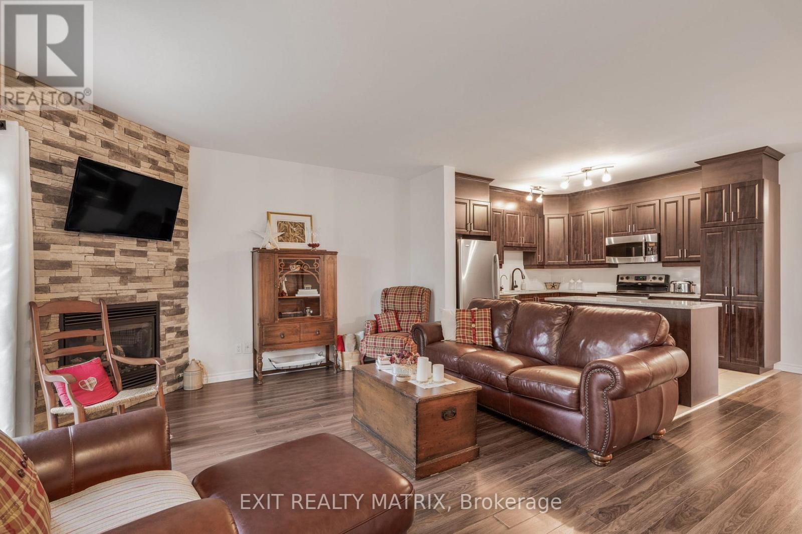 2 - 193 Bourdeau Boulevard, The Nation, ON - Indoor Photo Showing Living Room With Fireplace