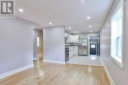 Open concept living room/ eat-in kitchen. -