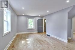 Alternate view of living room: LED pot lights. -