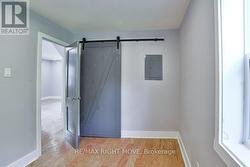 2nd bedroom has a railed closet door. -