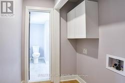 Alternate view of laundry room. -