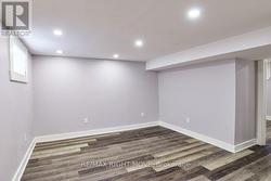 Alternate view of family room in basement. -