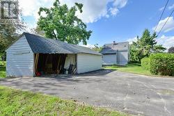 Alternate view of storage building; paved driveway -