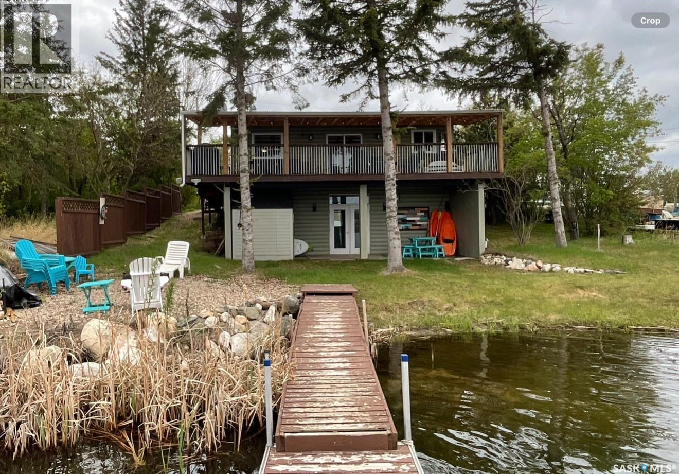3829 First Point Beach Drive, Hoodoo Rm No. 401, SK - Outdoor With Body Of Water With Deck Patio Veranda