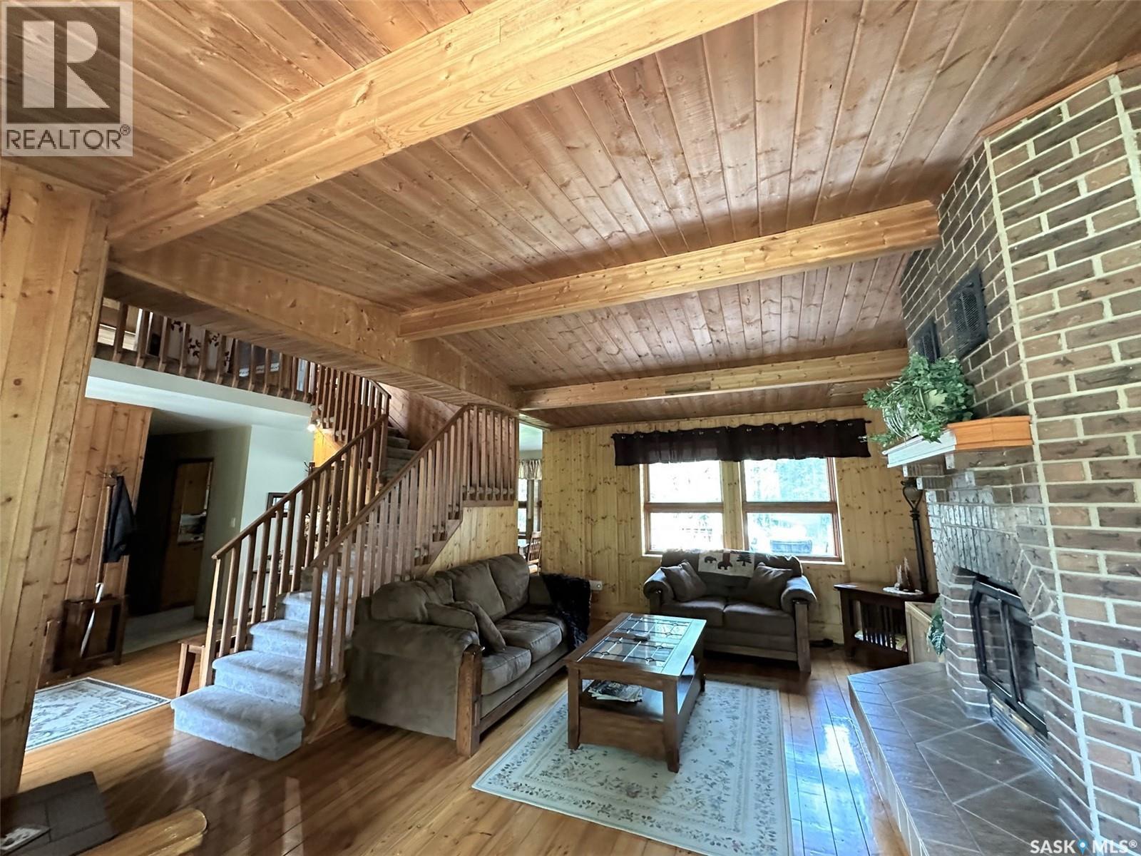 Jennings Ridge Acreage, Hudson Bay Rm No. 394, SK - Indoor Photo Showing Living Room With Fireplace