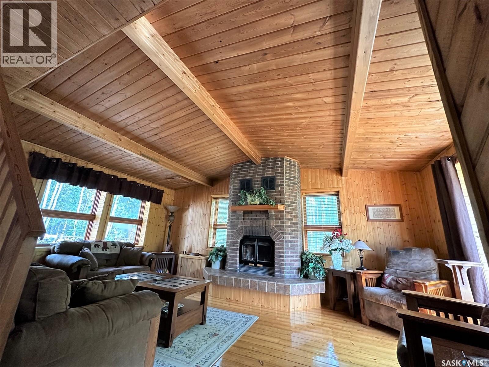 Jennings Ridge Acreage, Hudson Bay Rm No. 394, SK - Indoor Photo Showing Living Room With Fireplace