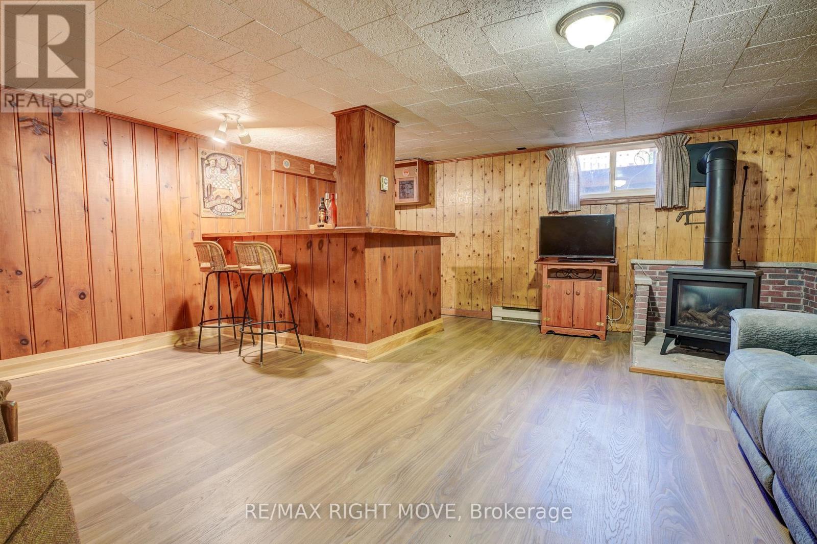 348 Collins Drive, Orillia, ON - Indoor Photo Showing Other Room With Fireplace