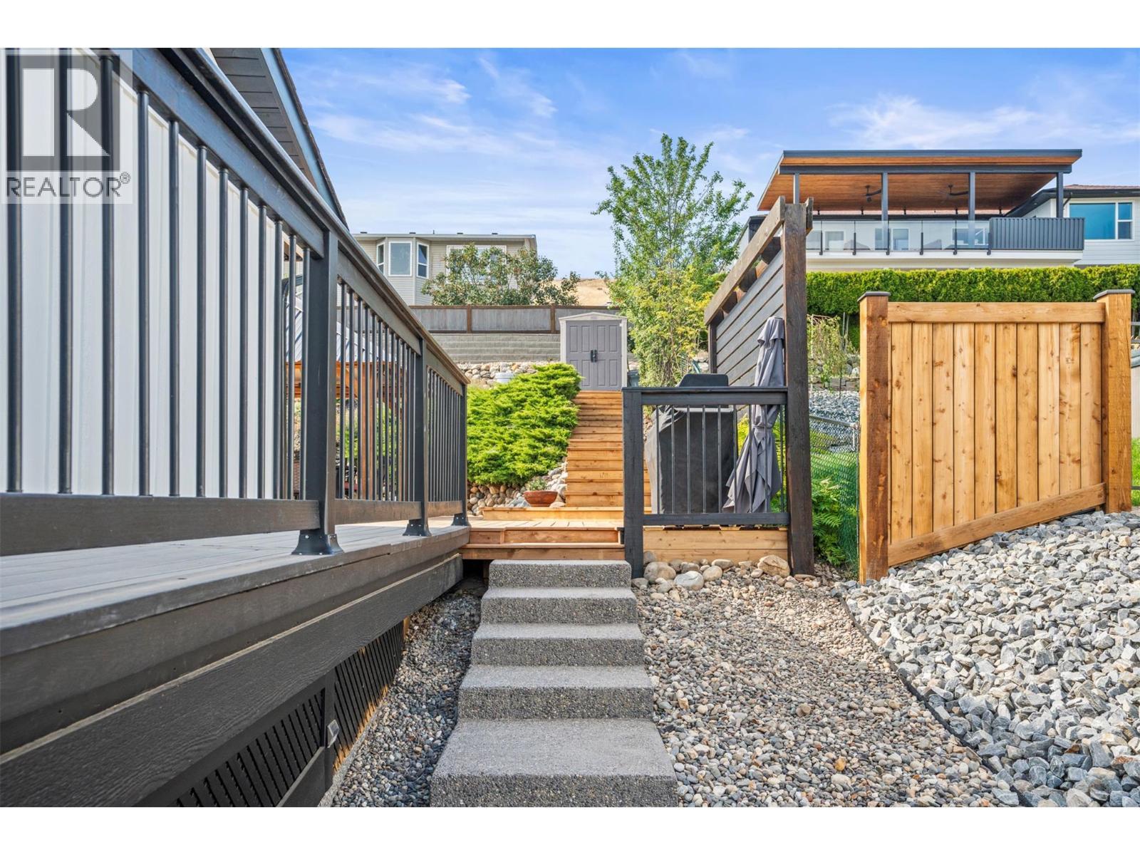 Side entrance to backyard - 8990 College Drive, Coldstream, BC - Outdoor With Exterior