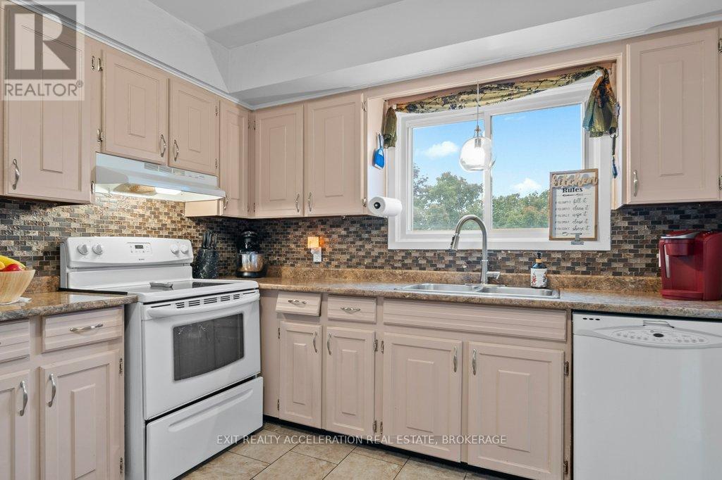 19 Mortensen Drive, Loyalist (Amherstview), ON - Indoor Photo Showing Kitchen With Double Sink