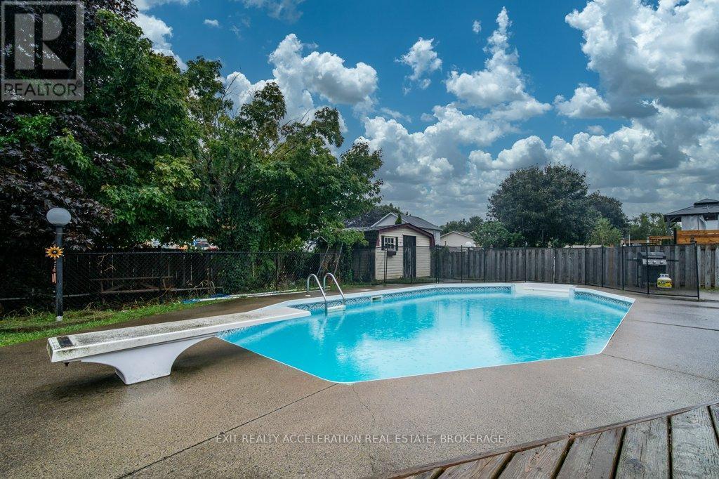 19 Mortensen Drive, Loyalist (Amherstview), ON - Outdoor With In Ground Pool With Backyard