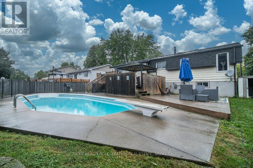 19 Mortensen Drive, Loyalist (Amherstview), ON - Outdoor With In Ground Pool With Deck Patio Veranda