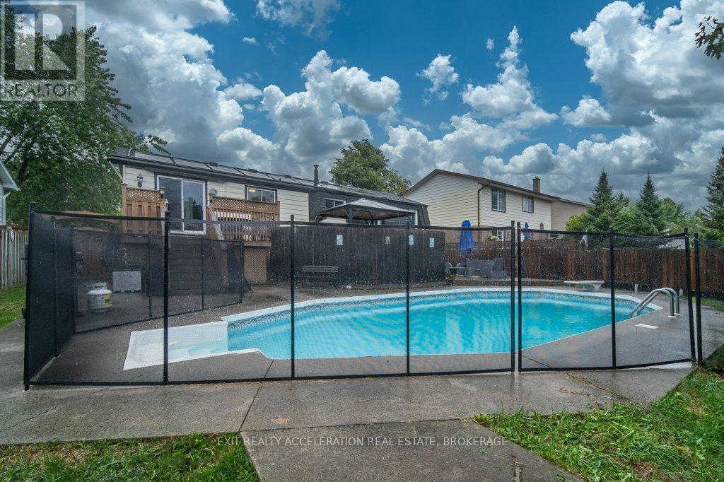 19 Mortensen Drive, Loyalist (Amherstview), ON - Outdoor With In Ground Pool