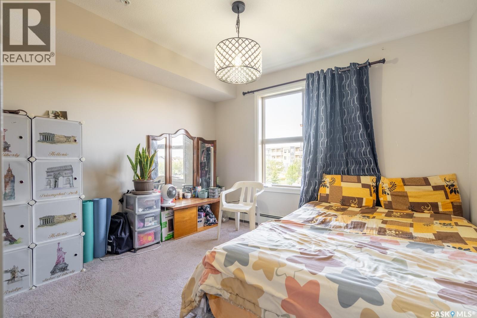 2320 5500 Mitchinson Way, Regina, SK - Indoor Photo Showing Bedroom
