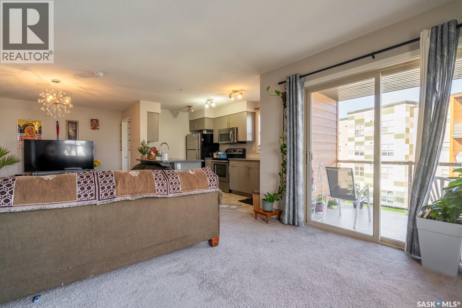 2320 5500 Mitchinson Way, Regina, SK - Indoor Photo Showing Living Room