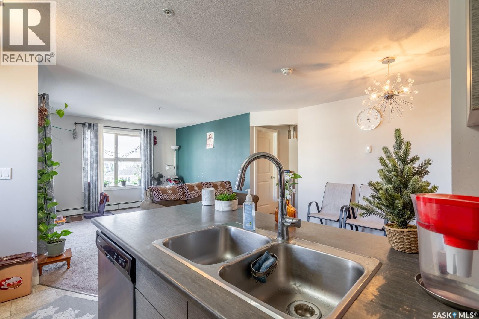 2320 5500 Mitchinson Way, Regina, SK - Indoor Photo Showing Kitchen With Double Sink