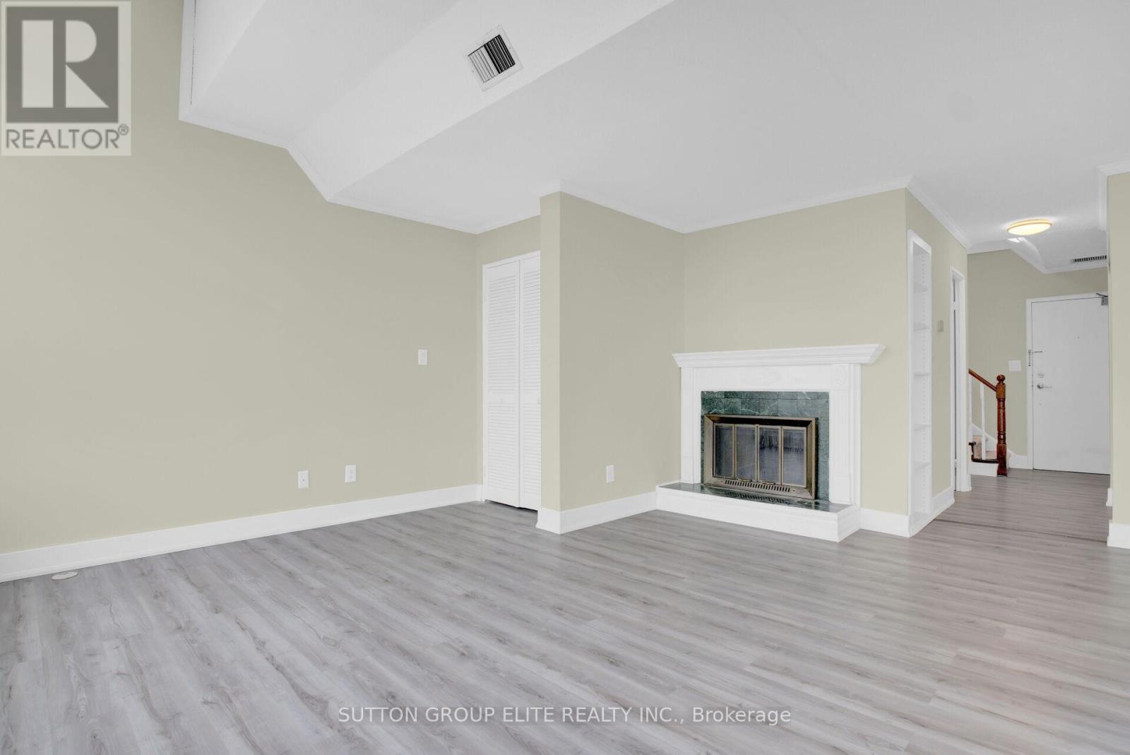5 - 200 Robert Speck Parkway, Mississauga, ON - Indoor Photo Showing Living Room With Fireplace