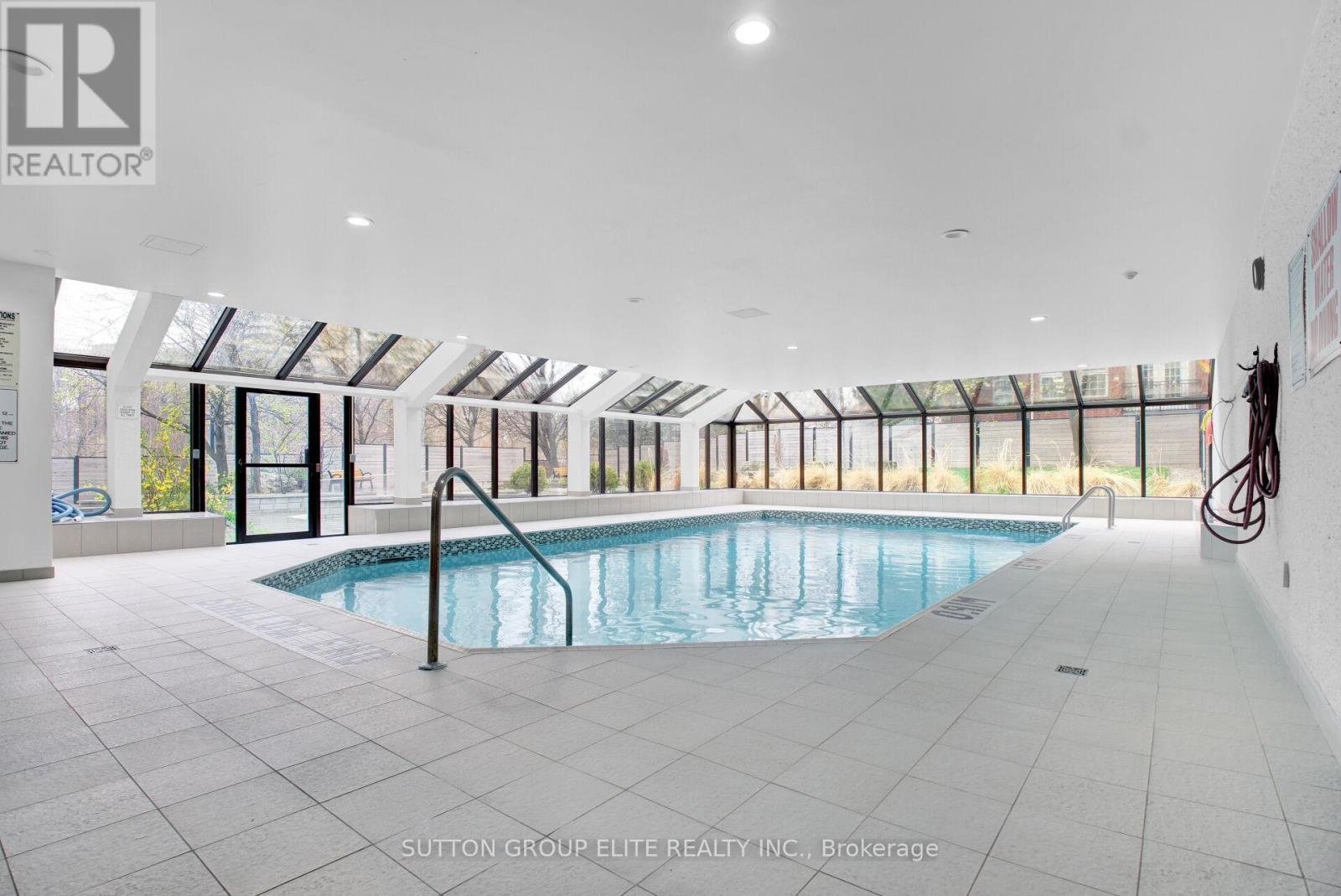 5 - 200 Robert Speck Parkway, Mississauga, ON - Indoor Photo Showing Other Room With In Ground Pool