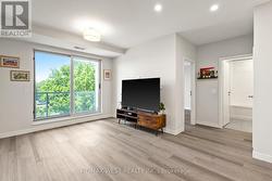 Bright Living Room With Balcony Walk-out -