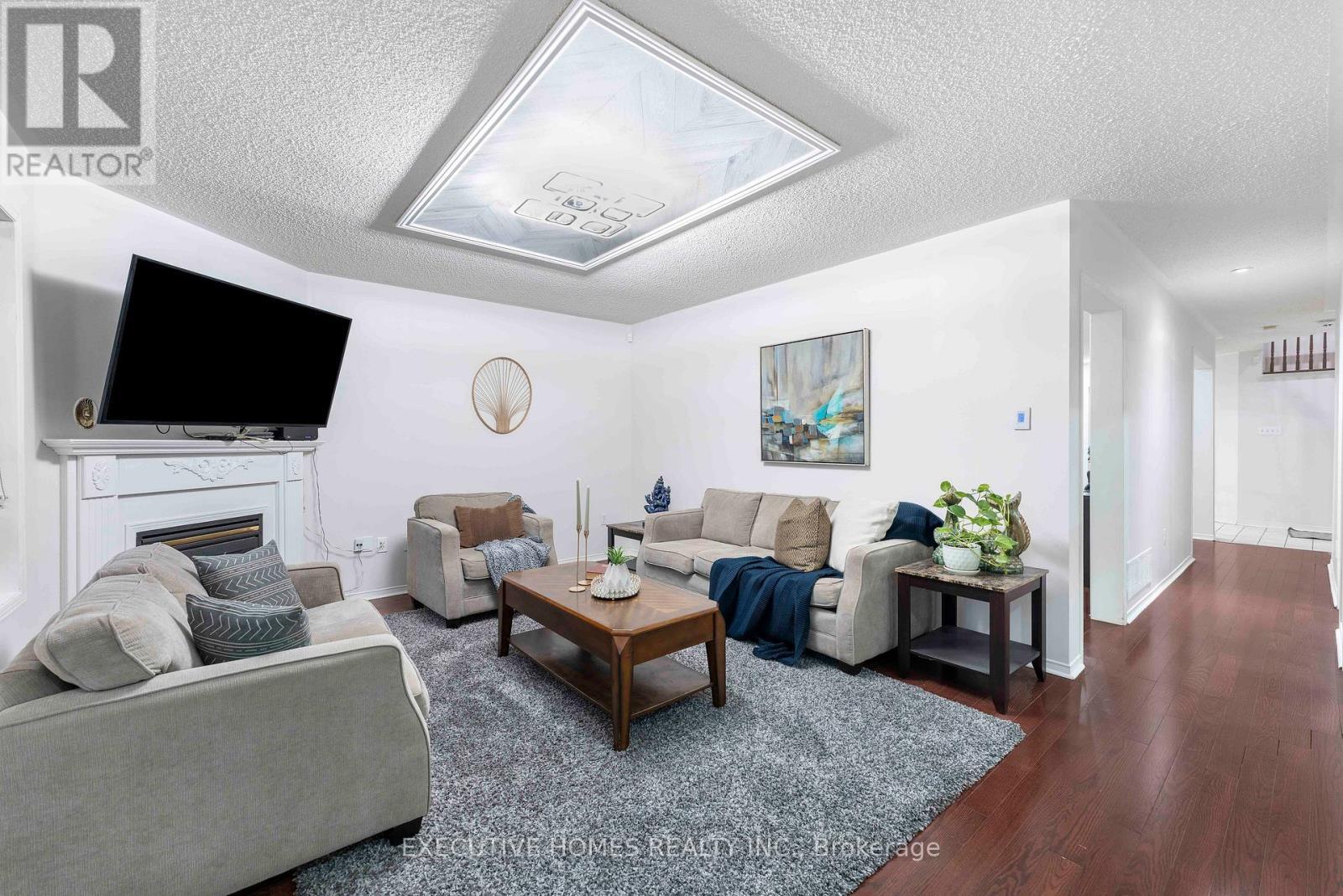 44 Pebblestone Circle, Brampton, ON - Indoor Photo Showing Living Room With Fireplace