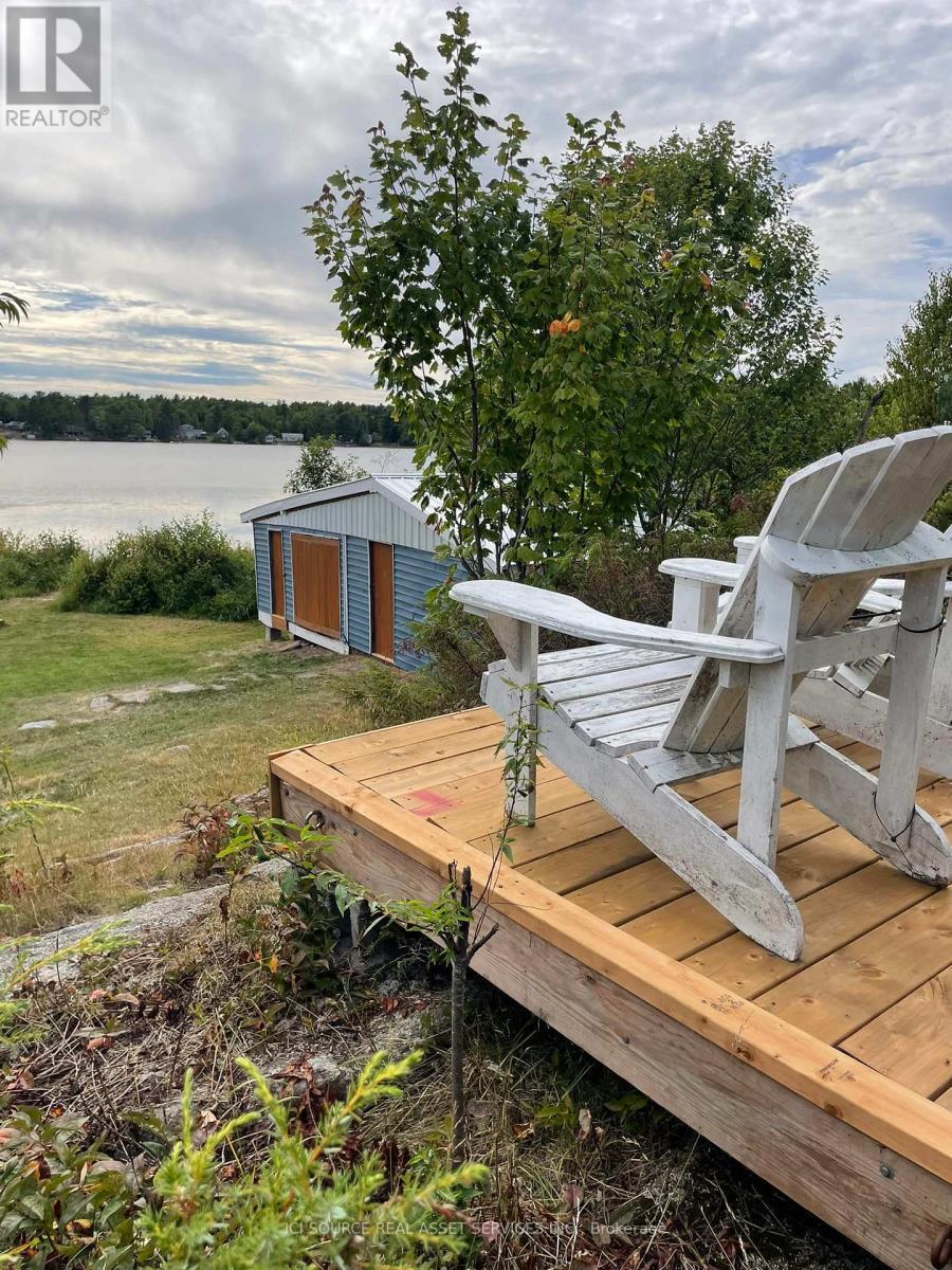 596C Ham Lake Road E, Killarney, ON - Outdoor With Body Of Water With Deck Patio Veranda