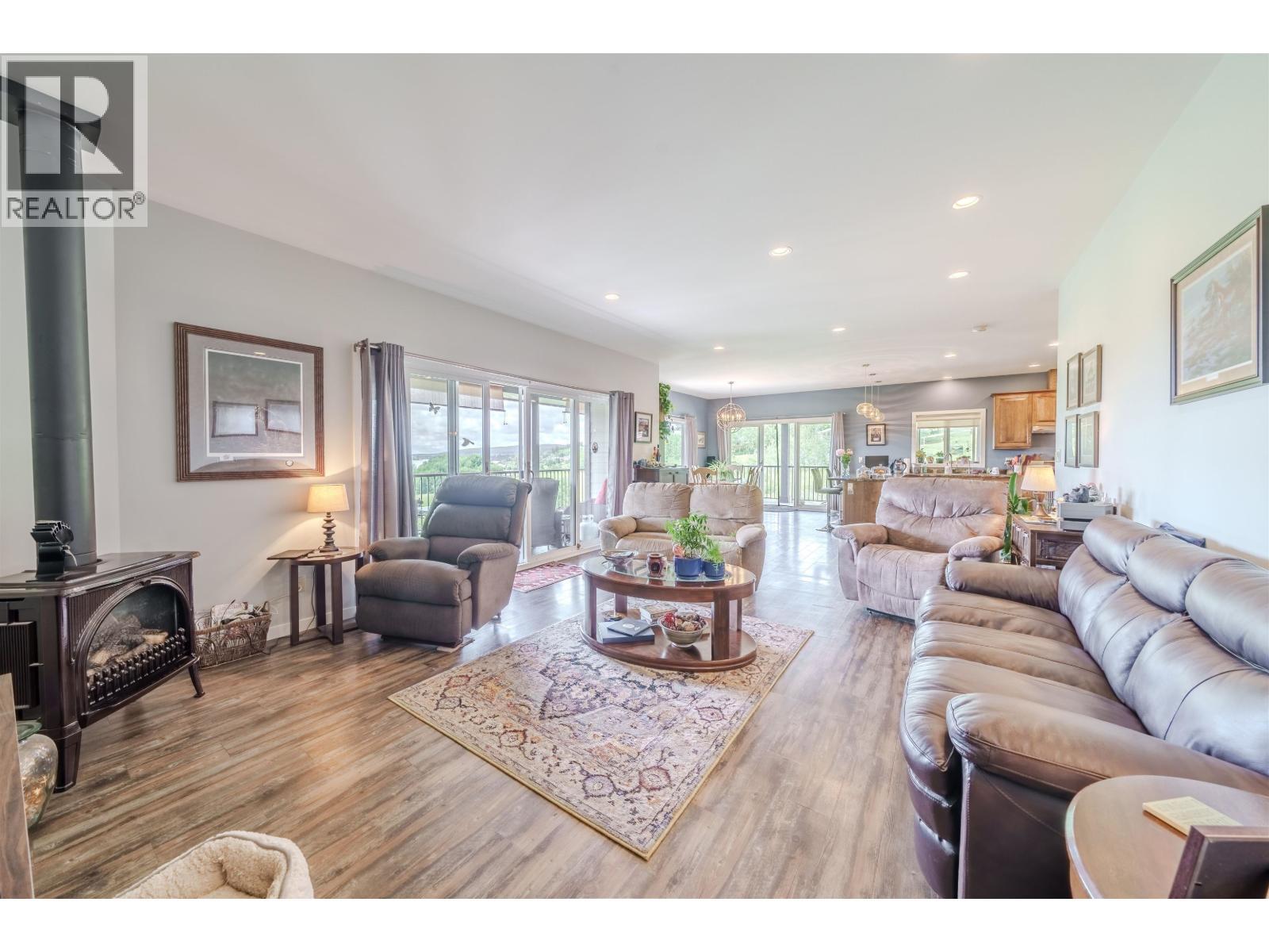 4162 Lac La Hache Station Road, Lac La Hache, BC - Indoor Photo Showing Living Room With Fireplace