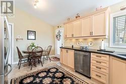 Kitchen with door to beautiful upper deck -