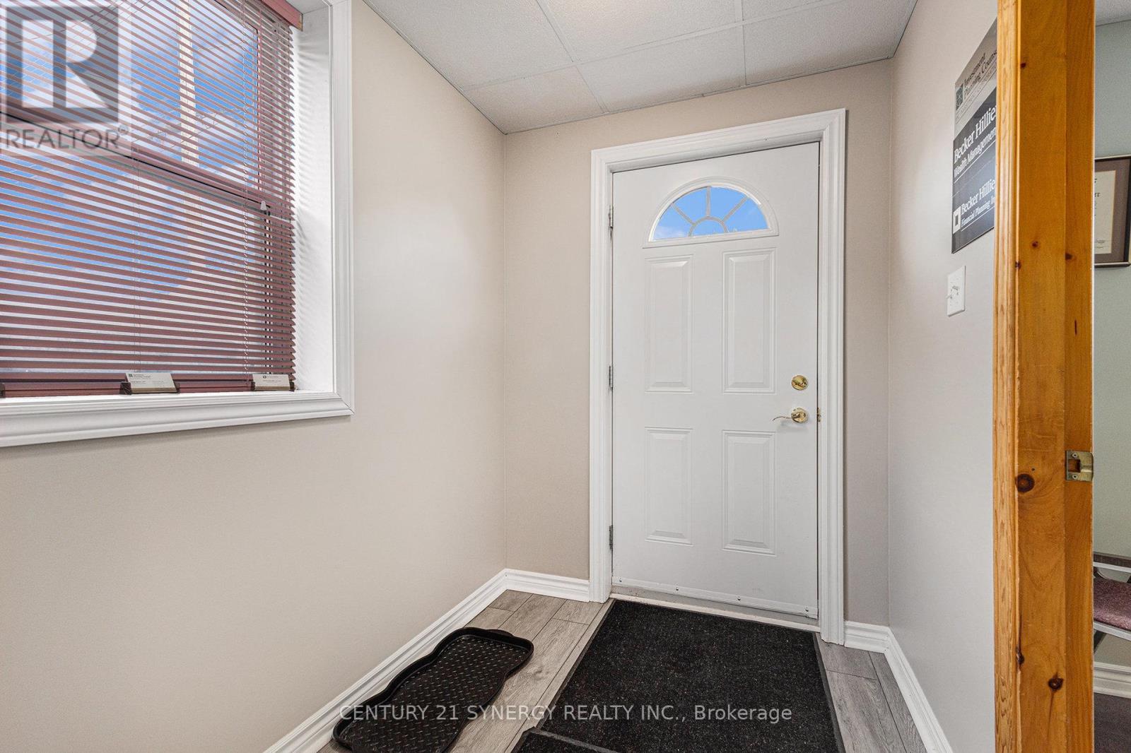 Foyer for two main floor businesses - 49 Main Street E, Smiths Falls, ON