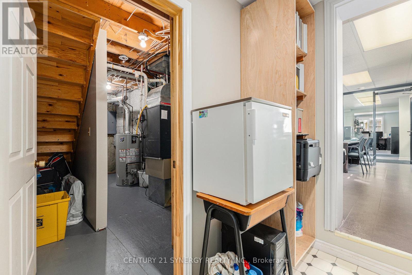 Kitchenette Unit 2 with entrance to storage - 49 Main Street E, Smiths Falls, ON