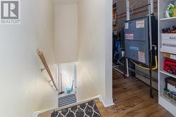 Back Door entrance and stairs to 2 bedroom apt. -